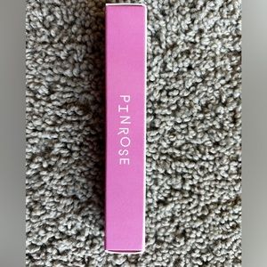 Pinrose Wild Child rollerball perfume.